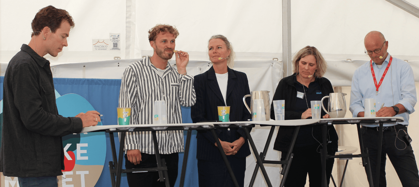 Fire paneldeltagere ved talk om bæredygtighed og turismeadfærd