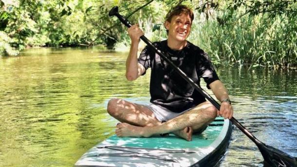 Mand på paddleboard på Odense Å